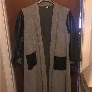 Tweed long duster with leather sleeves